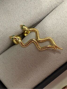 Gold Snake Earrings with Green Jeweled Eye Accents